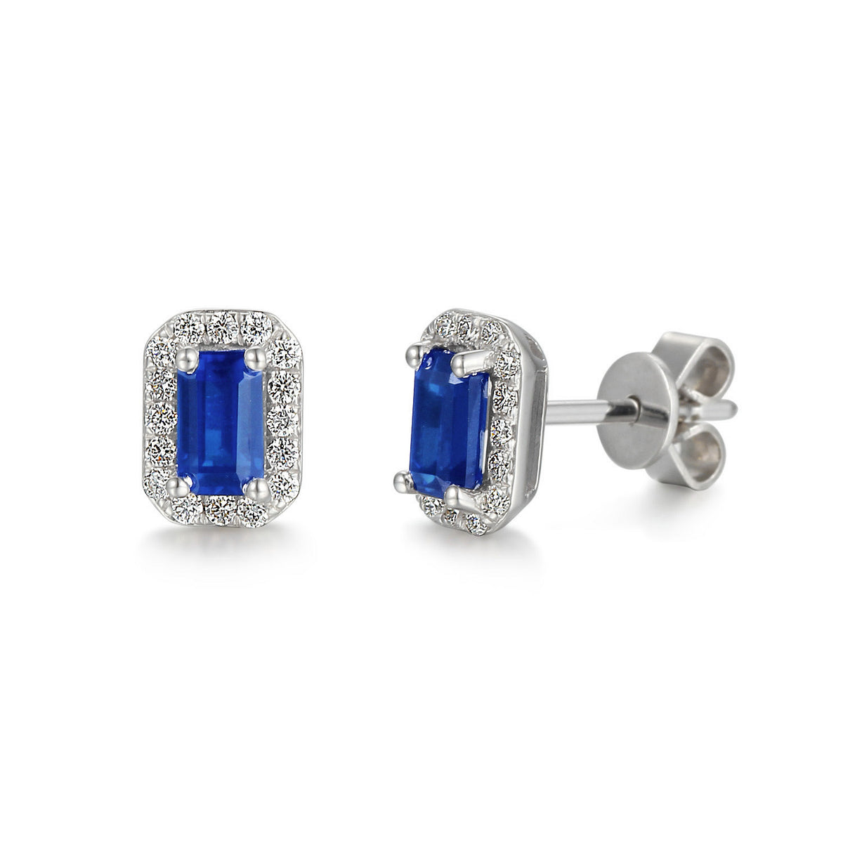 Emerald cut blue sapphire and diamond halo earrings in 18k white gold