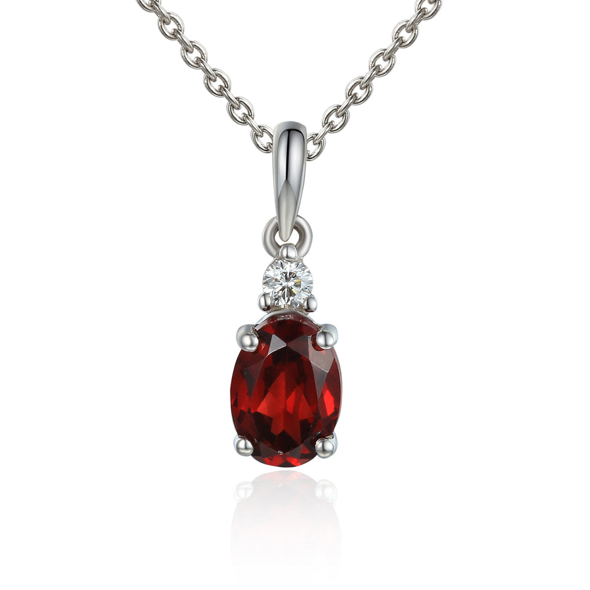 Oval garnet and diamond drop pendant and chain in 18k white gold