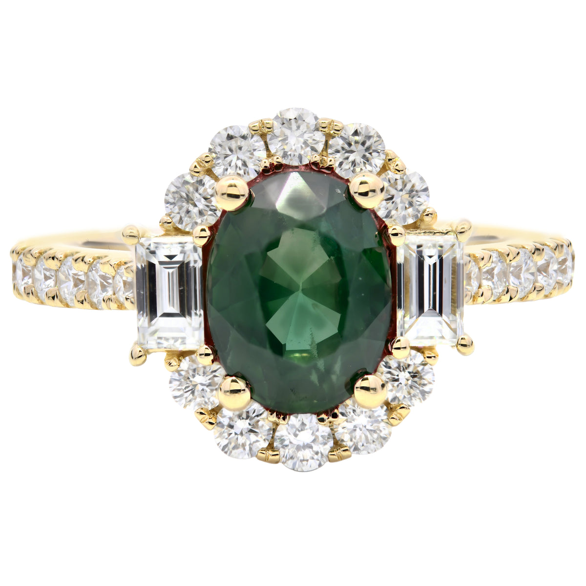 Teal sapphire and diamond halo ring in 18k yellow gold