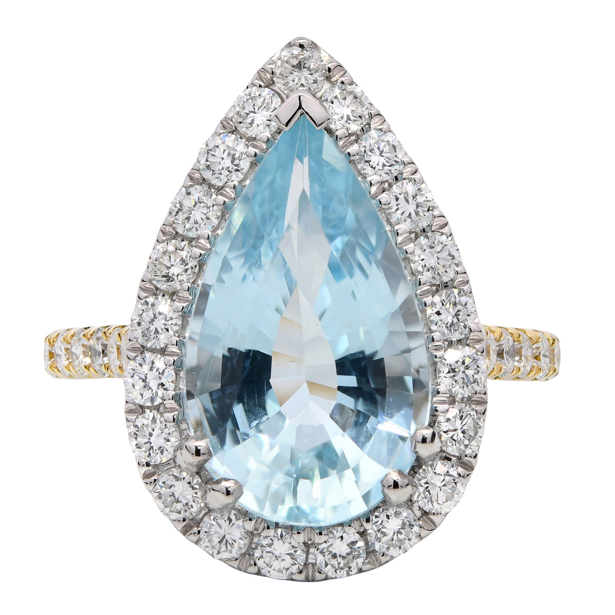 Aquamarine and diamond halo ring in 18k yellow gold and platinum