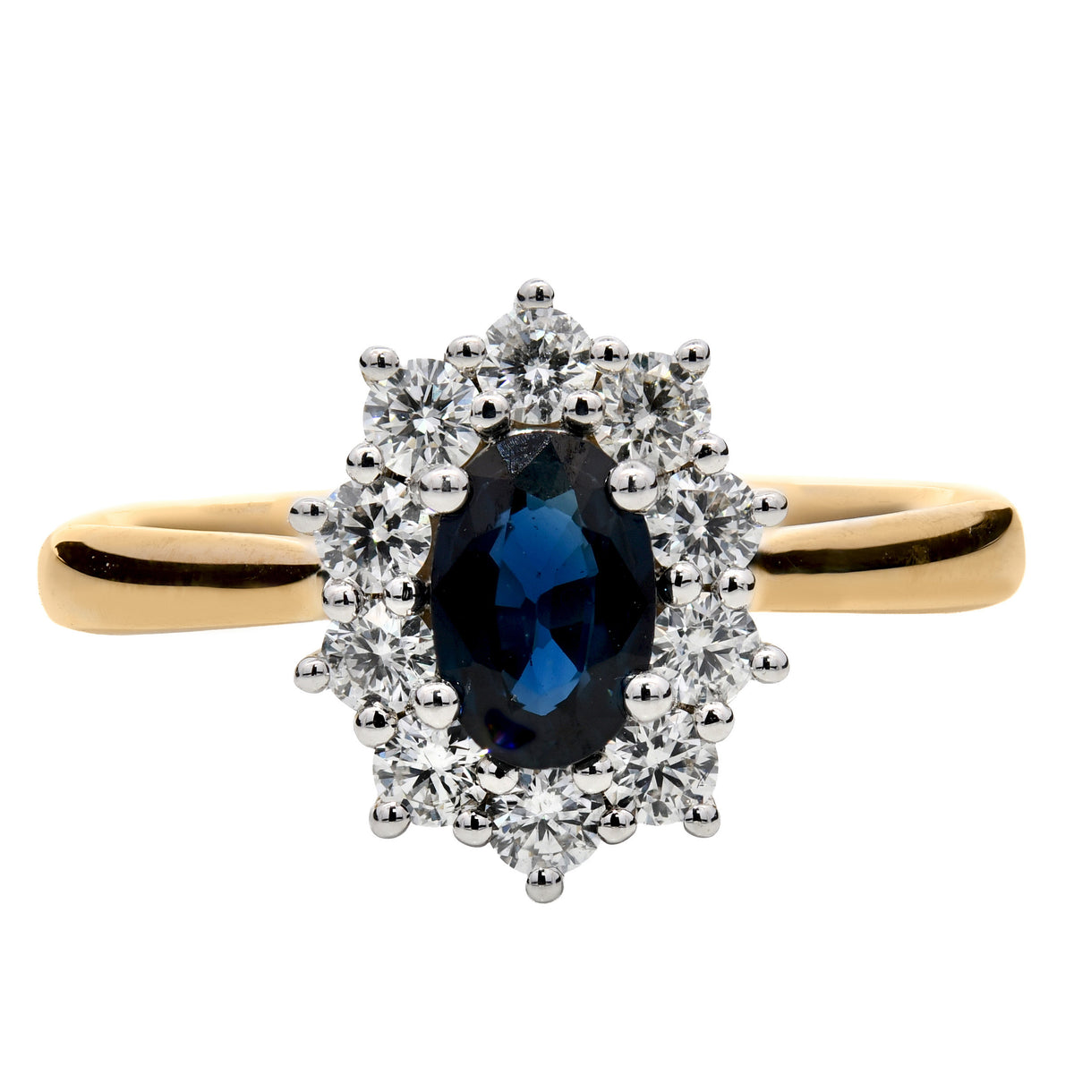 Blue sapphire and diamond oval cluster ring in 18k yellow and white gold