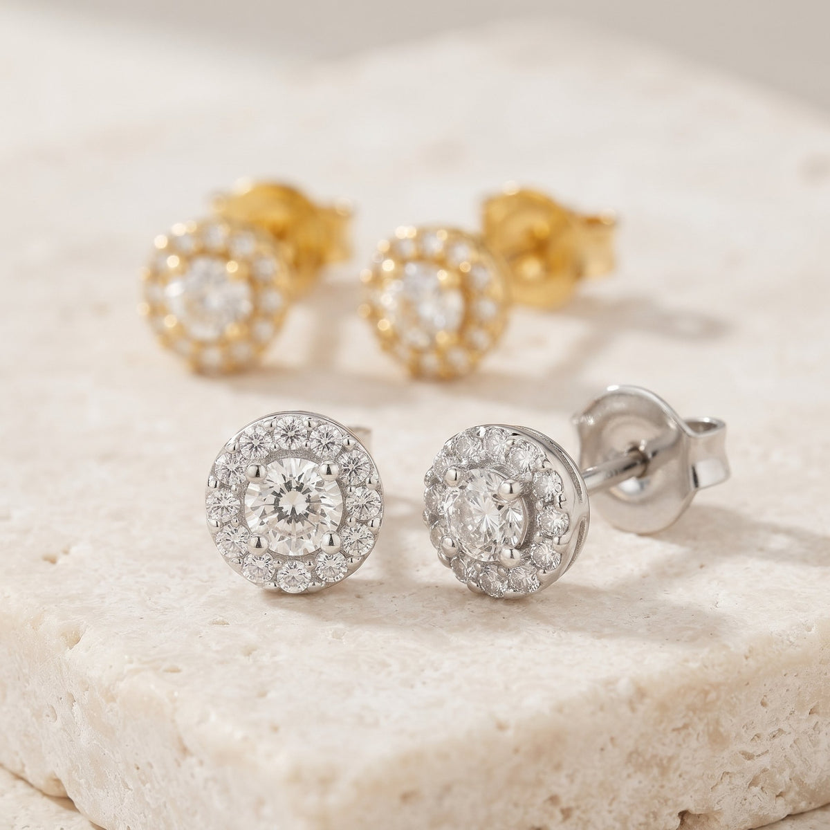 Diamond halo earrings in 18k white gold and 18k yellow gold