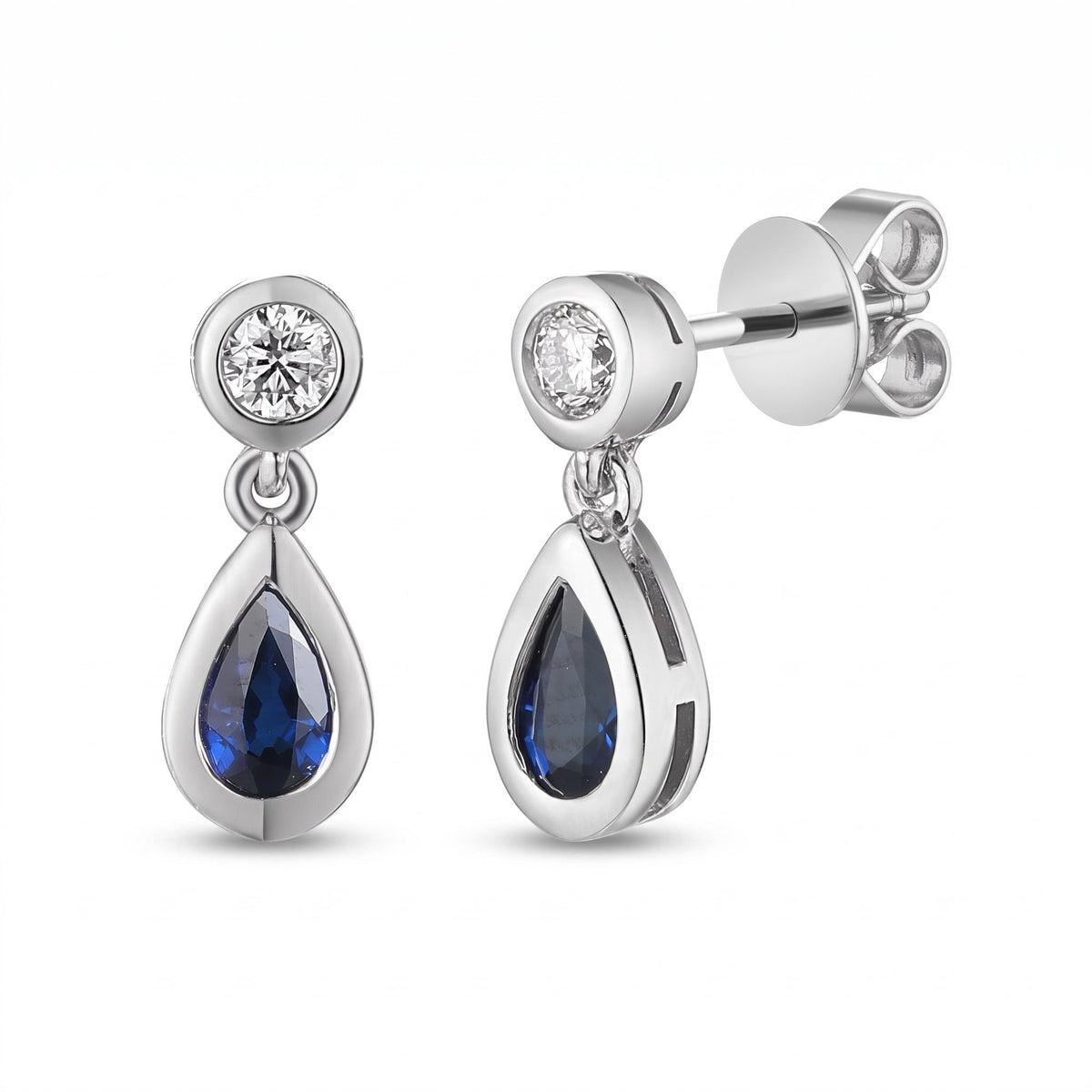 Pear sapphire and diamond rubover drop earrings in 18k white gold