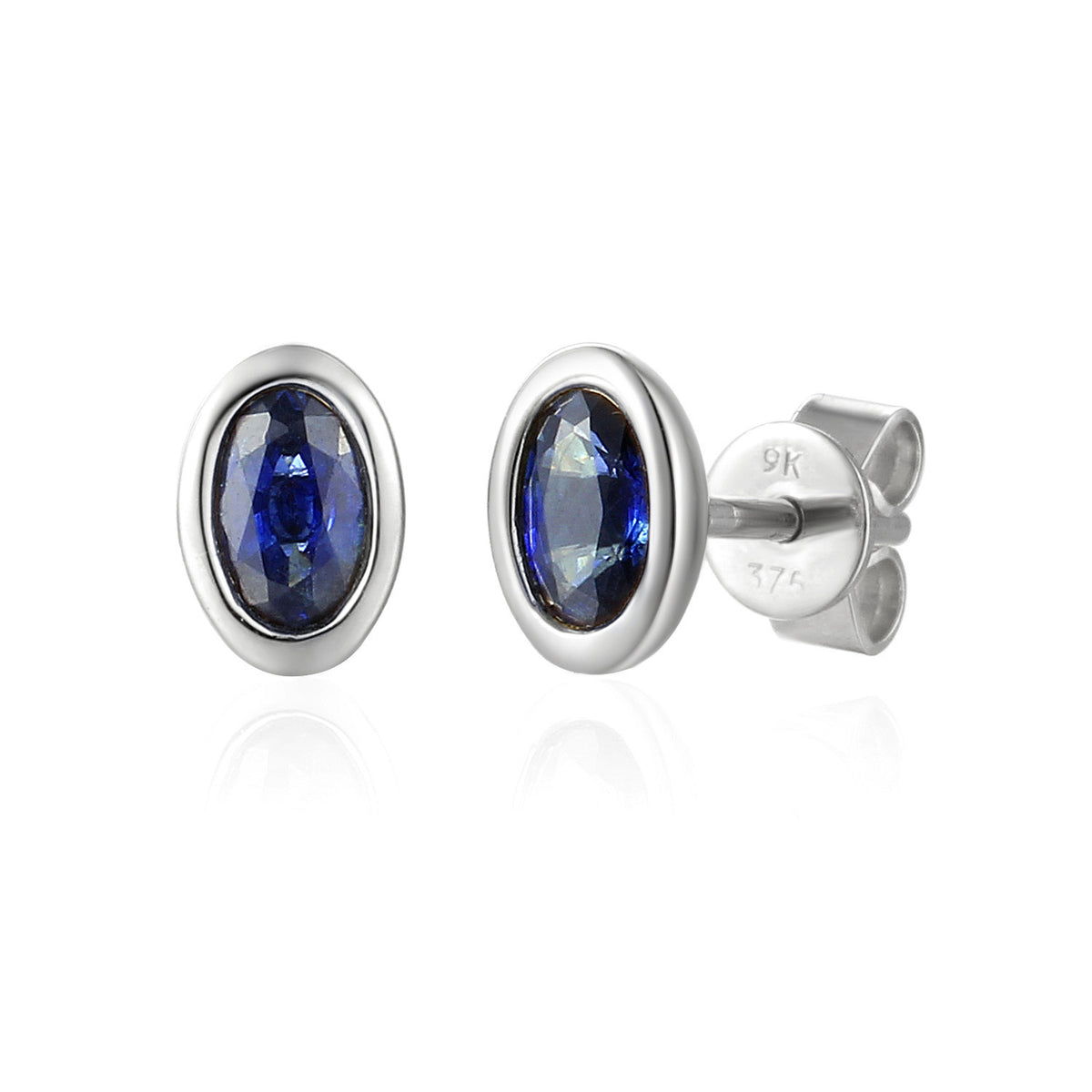 Oval blue sapphire rubover stud earrings in 18k white gold
