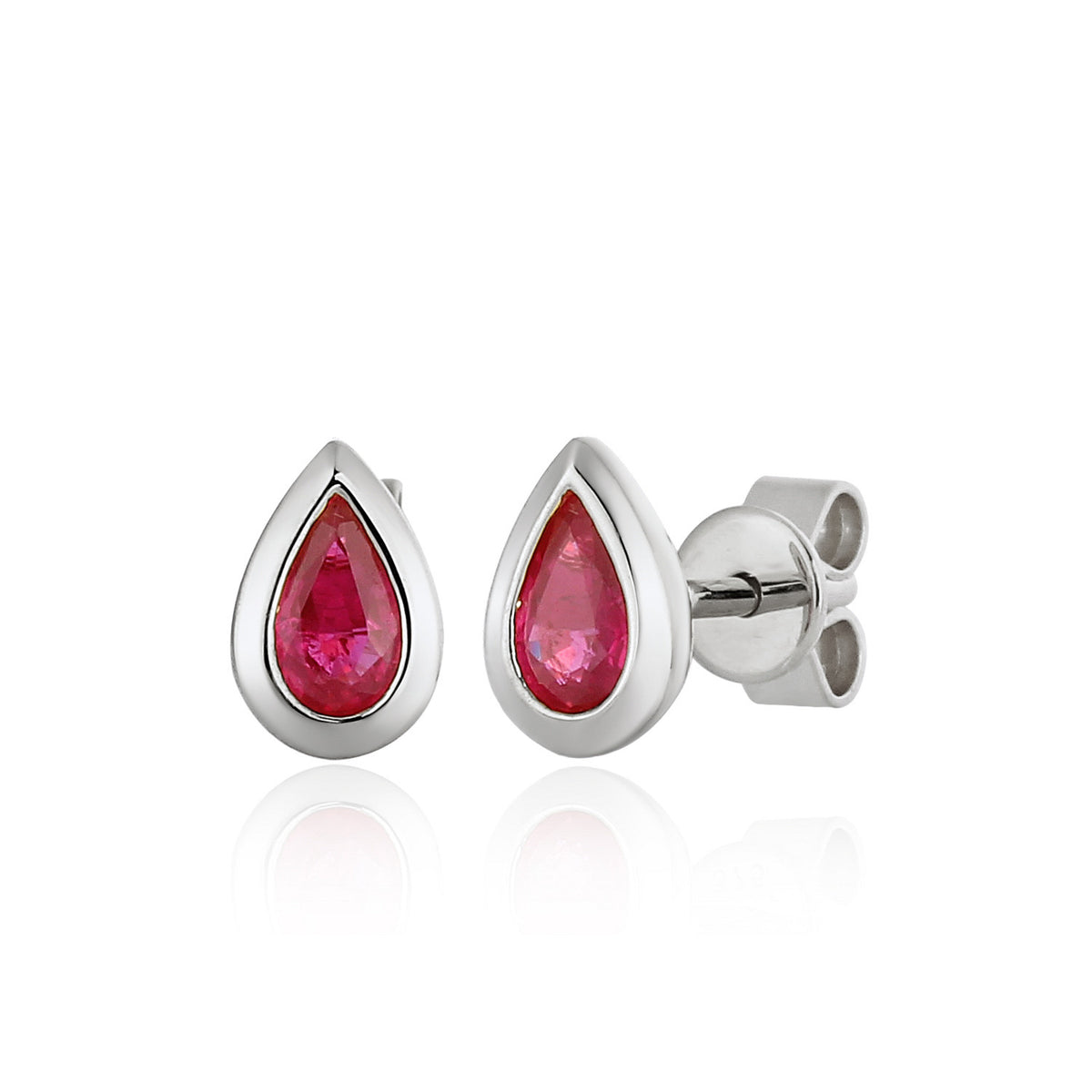 Pear ruby rubover stud earrings in 18k white gold