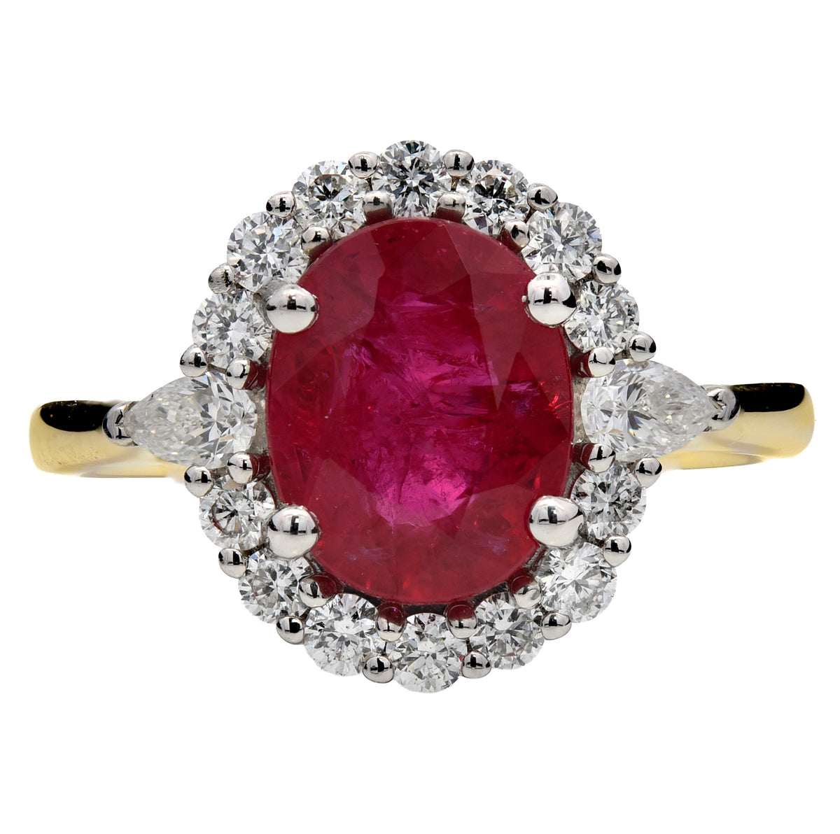 Ruby and diamond oval cluster ring in 18k yellow gold and platinum