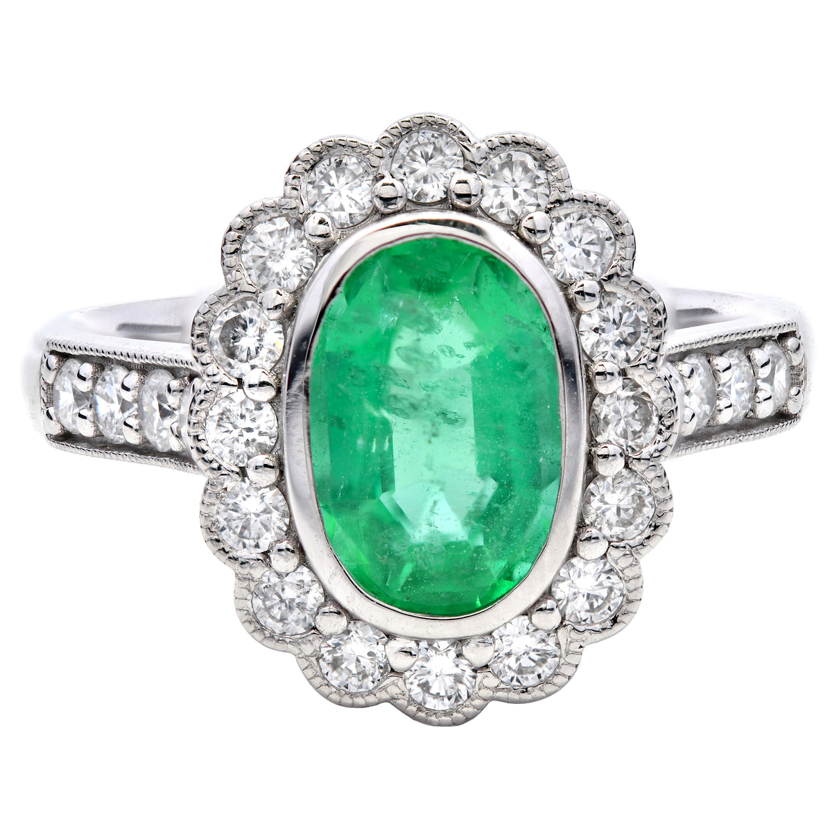 Emerald 1.25ct and Diamond 0.56ct Halo Ring in Platinum
