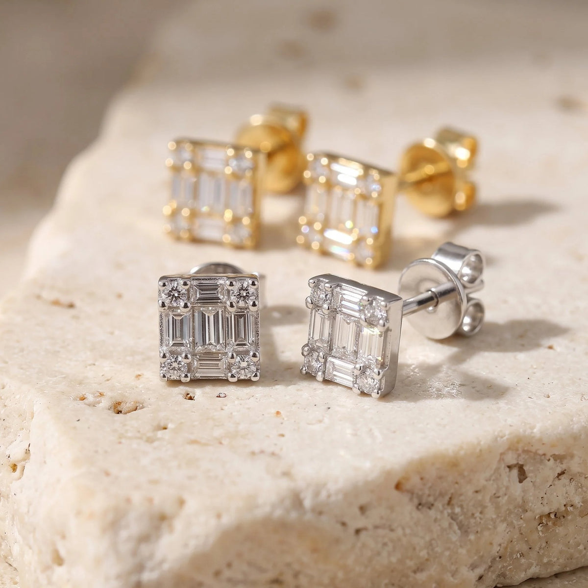 Baguette diamond stud earrings in 18k white gold and 18k yellow gold