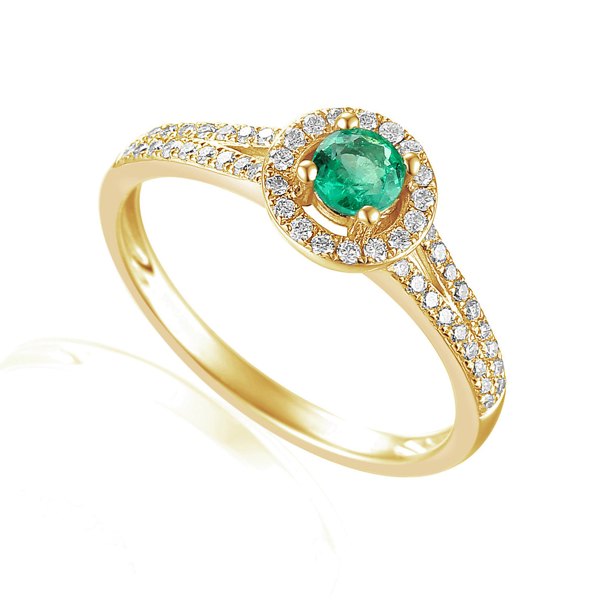 Emerald and diamond halo ring in 18k yellow gold