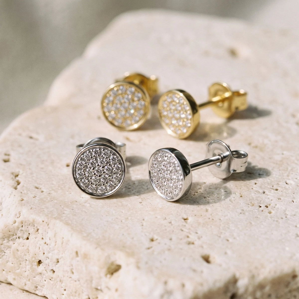 Diamond circle cluster stud earrings in 18k white gold and 18k yellow gold