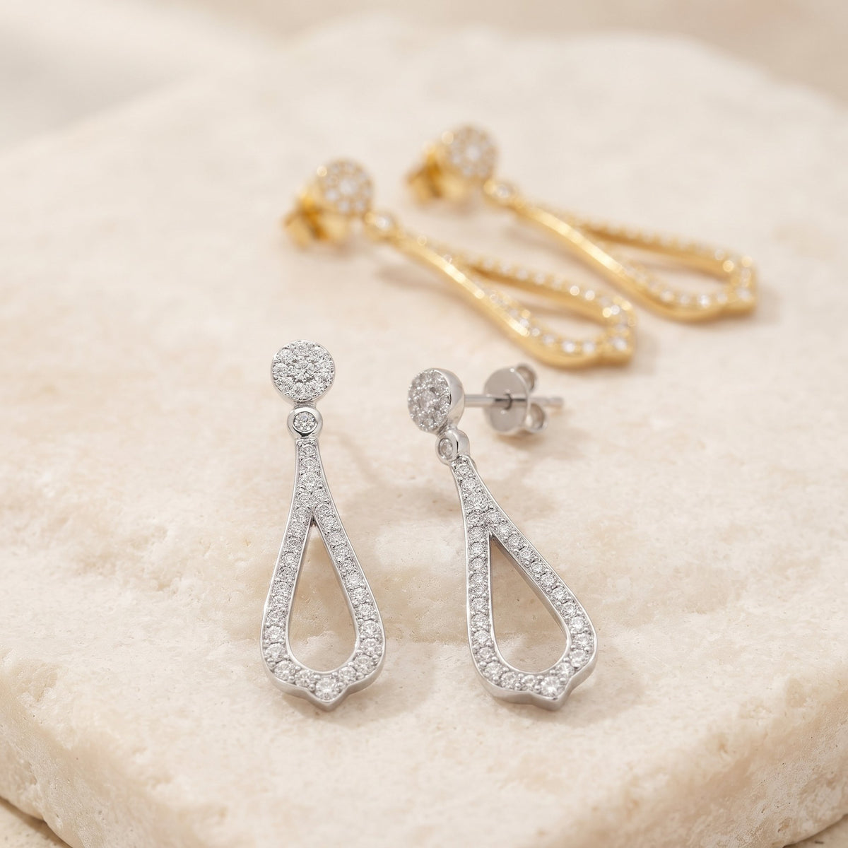 Diamond cluster drop earrings in 18k white gold and 18k yellow gold