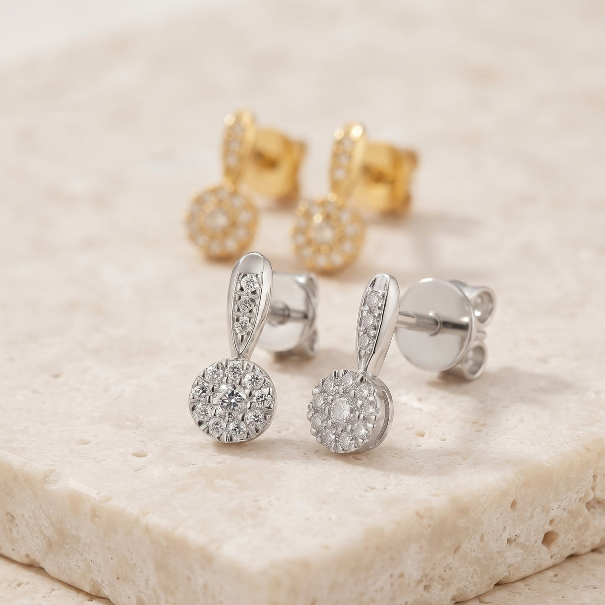 Pavé diamond circle drop earrings in 18k white gold and 18k yellow gold