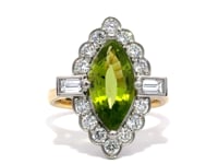 Video of the peridot and diamond marquise halo ring in 18k yellow gold and platinum