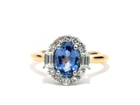 Video of the purple sapphire and diamond oval halo ring in 18k yellow gold and platinum